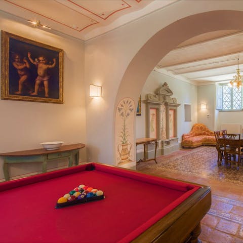 Gather in the elegant games room for an evening game for billiards