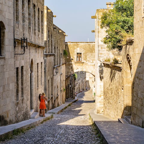 Drive into Rhodes Town for a wander along the Street of the Knights