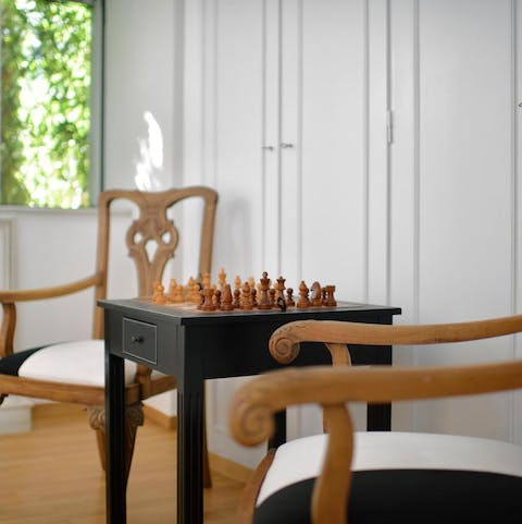 Challenge your loved ones to a game of chess in the main bedroom
