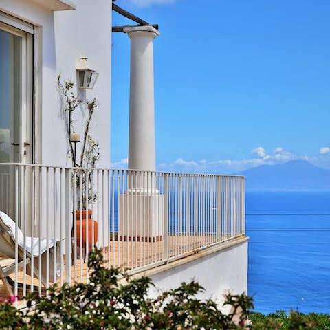 Take in breathtaking views of the Gulf of Naples from your balcony