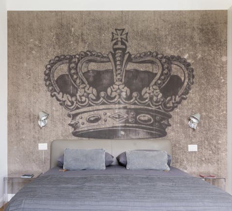 Enjoy a bold and regal design above the king-size bed