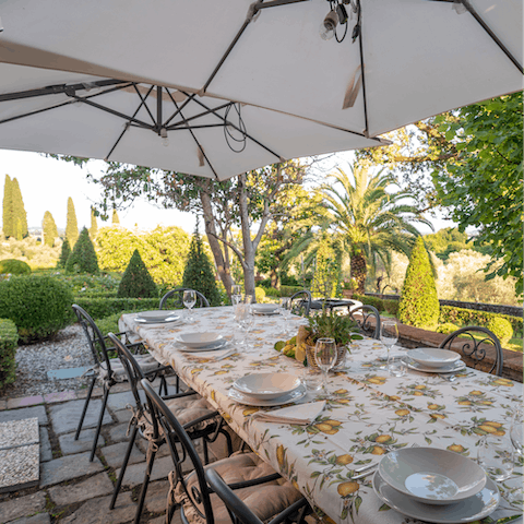 Host alfresco dinners during the balmy Italian evenings