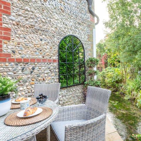 Have breakfast right next to the stream on your private patio