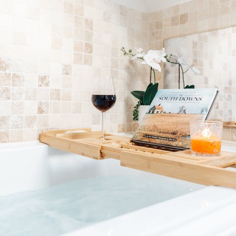 Relax with a long soak in the tub, glass of rosé in hand