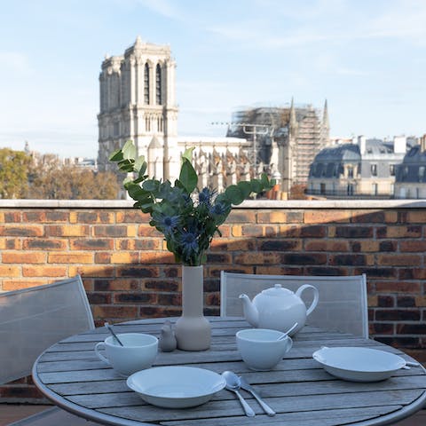 Sunny terrace with Notre-Dame views