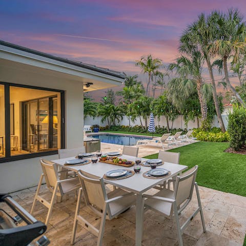 Gather on the terrace for a sunset barbecue and toast your getaway 