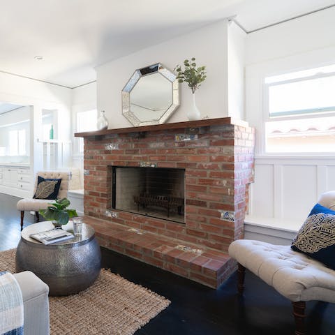 Admire the traditional brickwork of the decorative fireplace