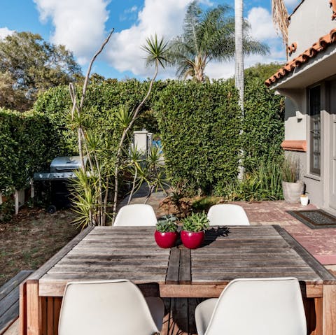 Enjoy breakfast out on the deck in your private garden