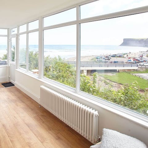 Admire the seascape from the sunroom