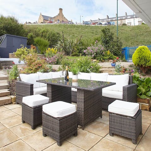 Enjoy an alfresco meal in the garden or relax with a drink as the sun goes down