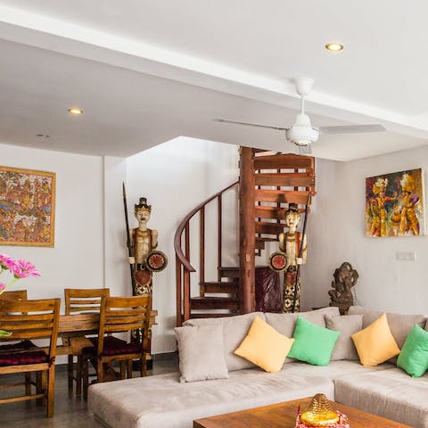 Find plenty of Balinese charm in the home's living room