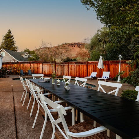 Come together for alfresco dinner party with a desert backdrop