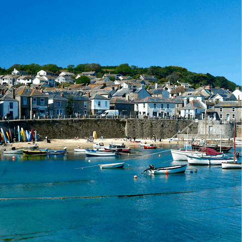 Visit the charming fishing village of Mousehole, a five-minute drive away