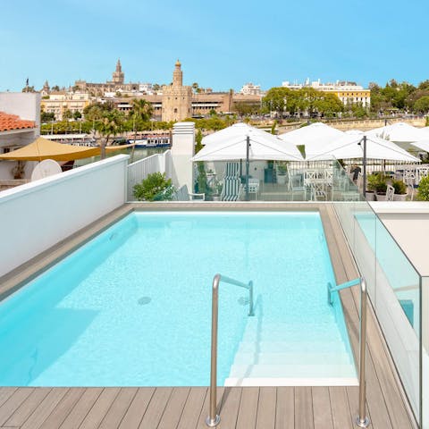 Cool off from the Seville sun in the communal pool