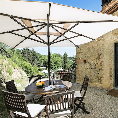 Sit down in the shade and savour a glass of wine