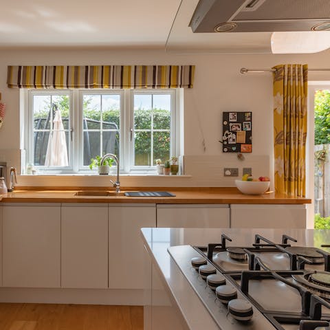 Whip up family meals in the spacious, well stocked kitchen