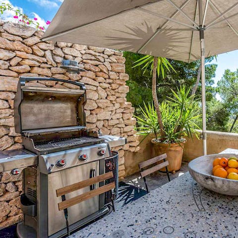 Prepare your meals under the open skies in the outdoor kitchen