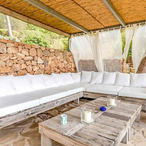 Take a break from the Mediterranean sun under the covered patio