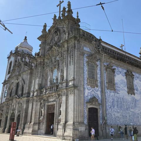 Visit the iconic tiled Igreja do Carmo, a short walk away
