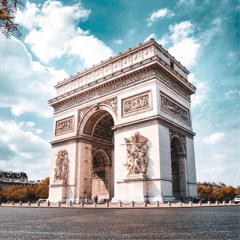 Gaze up at the iconic Arc de Triomphe, just a short stroll from your door