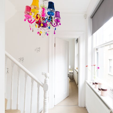 Pause to admire the colourful chandelier on the staircase