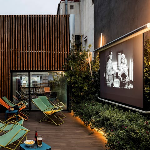 Watch a movie in the open-air cinema – don't forget to bring some popcorn with you