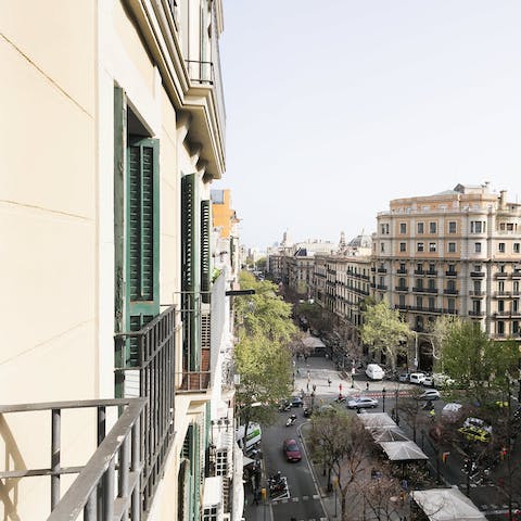 Take in the views over La Rambla de Catalunya, with its fashion shops