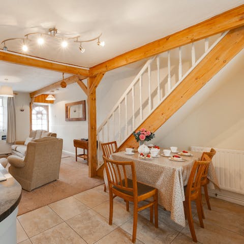 Admire the wonderful use of chunky, timber beams in the living space