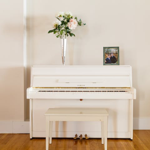 Get social around the striking white Yamaha piano