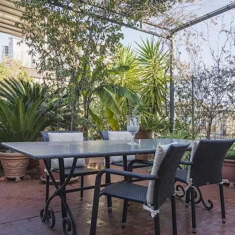 Sip a fresh cup of coffee in the sunshine on your leafy terrace