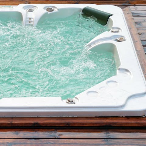 Step into the hot tub and admire the incredible views