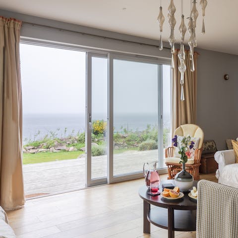 Slide open the living room doors and step out onto the seaview terrace