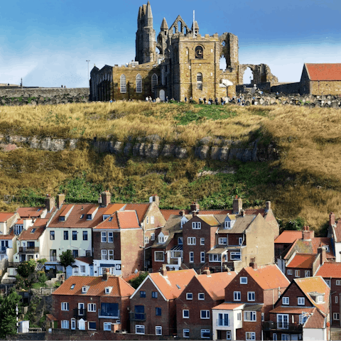 Climb the famous 199 steps of Whitby to reach the town's Abbey, less than ten minutes away in the car