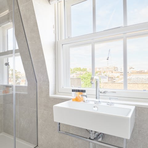 Freshen up in the bathroom as you look out from the traditional sash windows