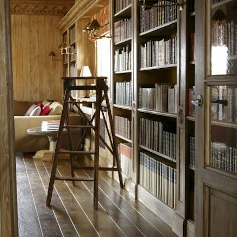 Browse the extensive home library in between sessions on the slopes