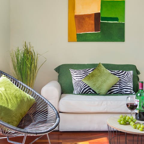 Feel at ease among the calming colours, vibrant wall art and zebra-stripe cushions
