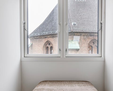 Admire the beautiful views of The Round Tower from the windows