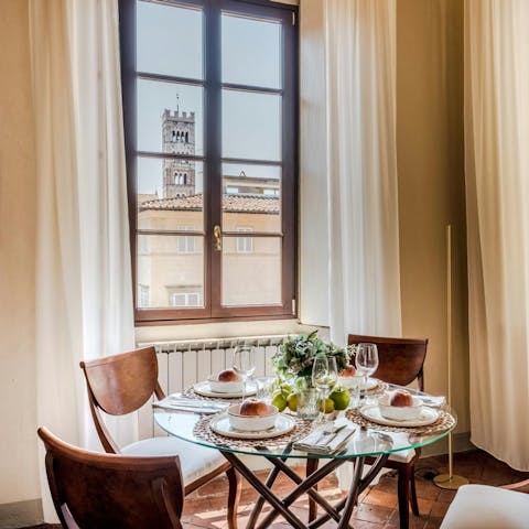 Admire pretty Lucca views over breakfast