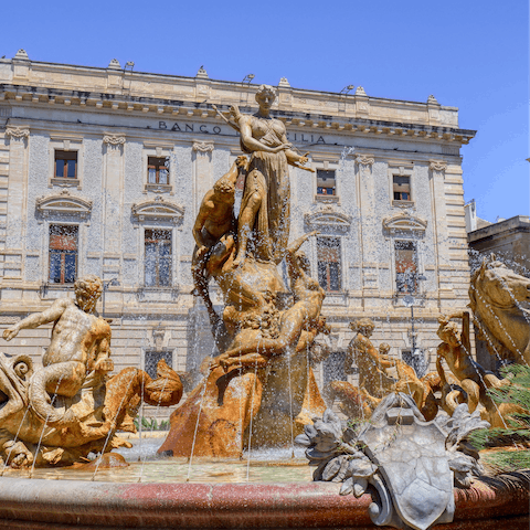 Visit the Fontana di Diana, a short stroll away