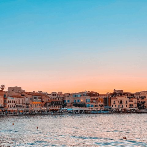 Explore the shops, restaurants, and bars along the Old Venetian Harbour