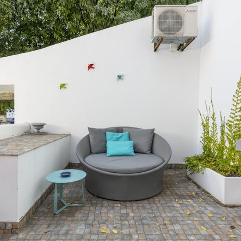 This cosy sofa on the terrace