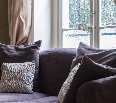 The snug sofa perfect for lazy afternoons