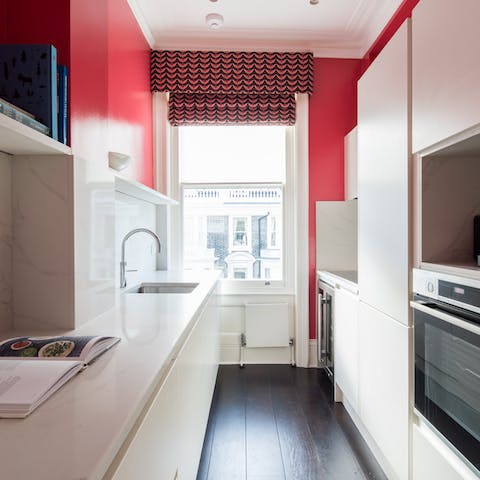 The bright red kitchen walls