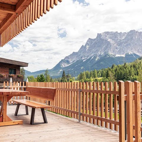 Enjoy your morning coffee on the terrace as you look out at the alpine scenery