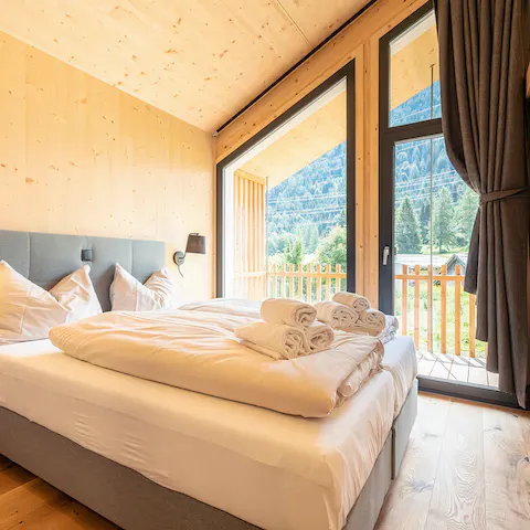 Wake up to stunning mountainous views and sunlight streaming in to greet you