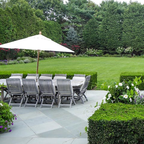 Dine alfresco in the one acre of pretty gardens