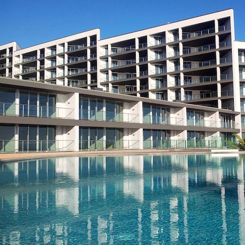 Enjoy a refreshing swim in the communal pool as the sun warms your skin