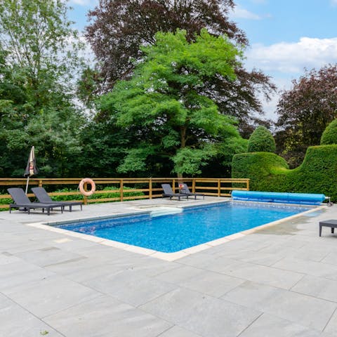 Have fun swimming and splashing around together in the shared outdoor pool