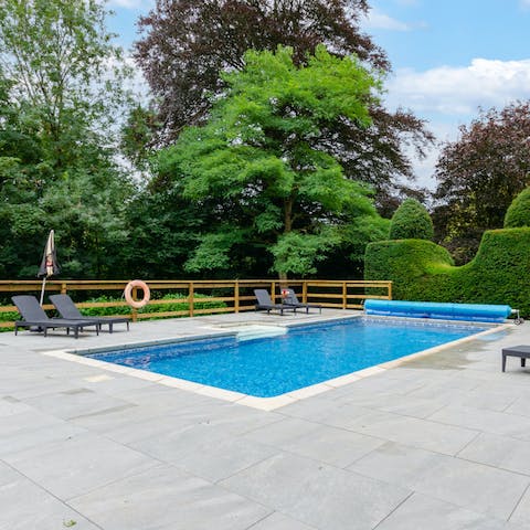 Have fun swimming and splashing around together in the shared outdoor pool