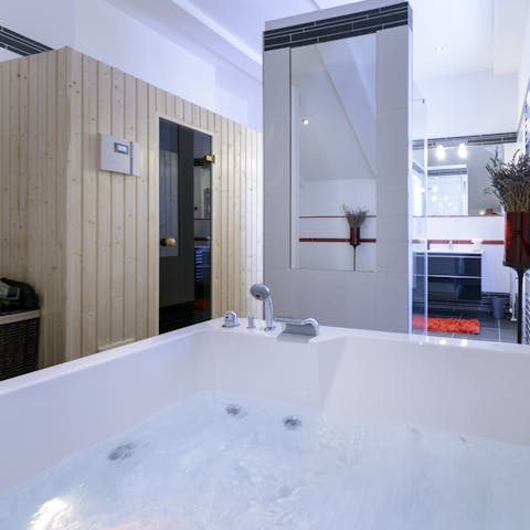 Relax in the hot tub and sauna in the master suite